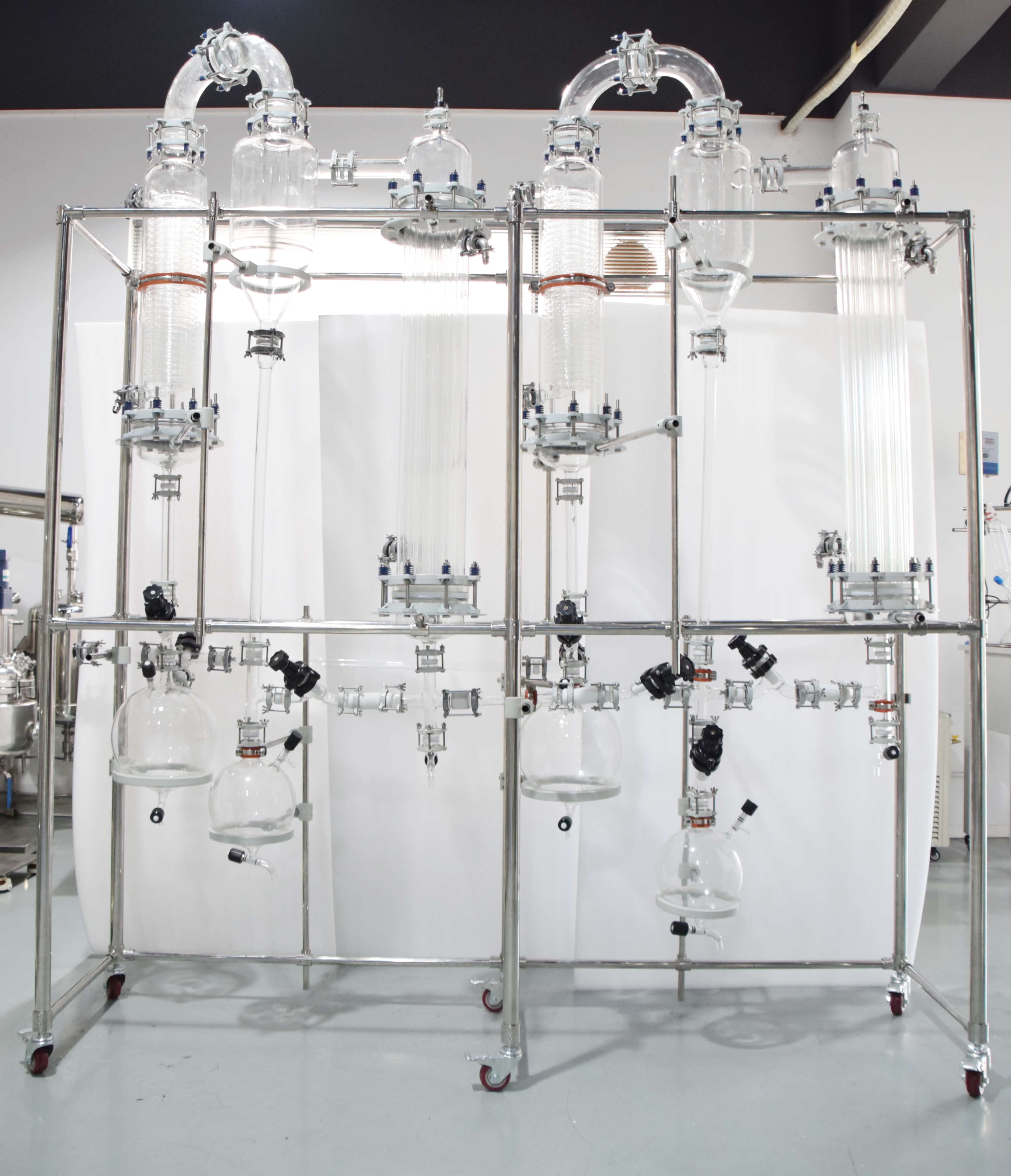 Evaporador de película ascendente de vidrio